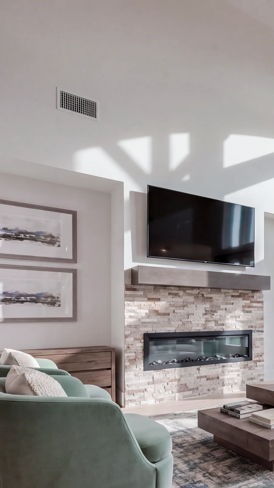 Living room at 821 Oleander, wide frame and its stacked stone fireplace and mantel