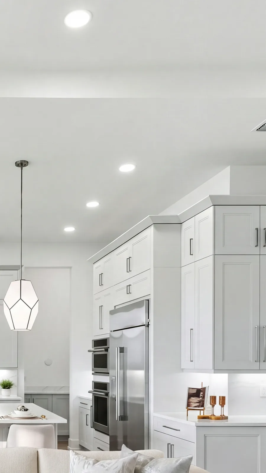 Kitchen at 13377 Shinnecock Dr, wide frame and its built-in refrigerator, wall ovens and cabinetry