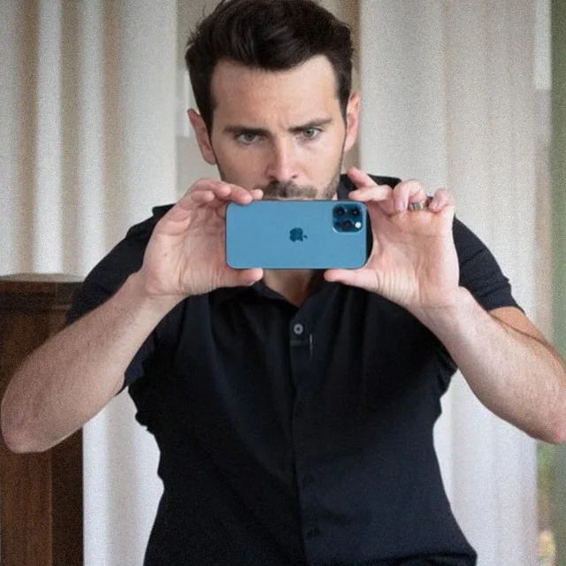 Chad Davies photographing a model home